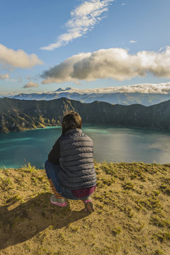 Young Woman Watching the View at Quilotoa Lake