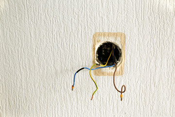 Wall with wires of removed socket