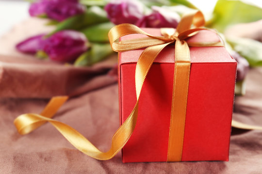 Gift box with tulips, closeup
