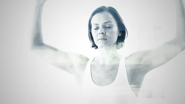 Double exposure of woman practicing yoga