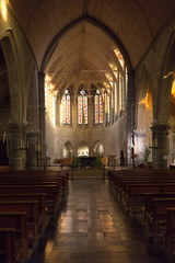 Fototapeta premium Valenciennes, France, 2017/01/06. The interior of the gothic church of Saint Gery (Gaugericus) with pointed arches.