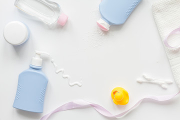 baby accessories for bath with duck on white background