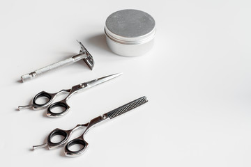 white desktop with tools for shaving beards