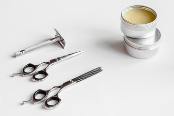 white desktop with tools for shaving beards