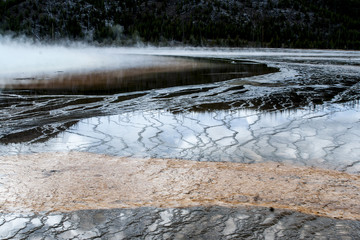 guyser with steam at yellowstone