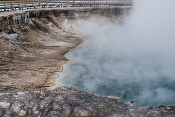 ice created by steam fron nearby guyser at yellowstone