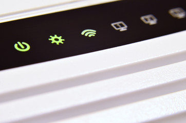 Detailed photo light bulbs from the Internet modem. Abstract technology background. Modern glowing...