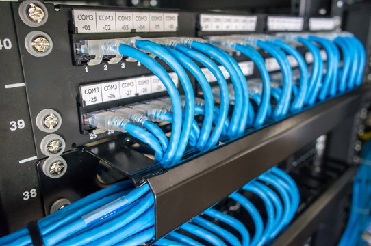 Ethernet cables and path panel in rack cabinet