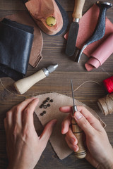 cobbler tools in workshop dark background top view
