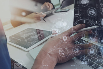 Designer Businessman hand using smart phone,mobile payments onli