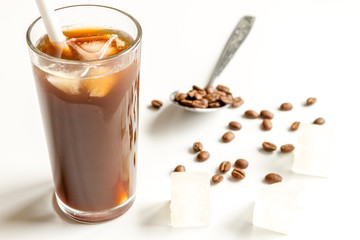 coffee with ice in glass on white background