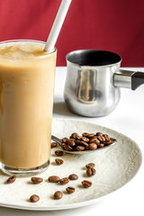 coffee with ice in glass on white background