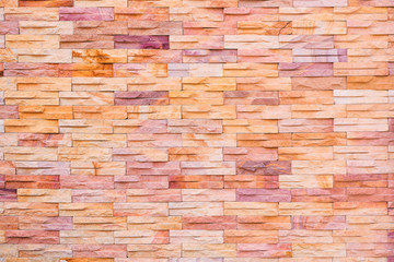 Brown stone brick wall background.