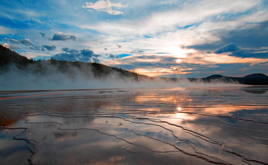 Grand Prismatic Spring at sunset in the Midway Geyser Basin in Yellowstone National Park U S A