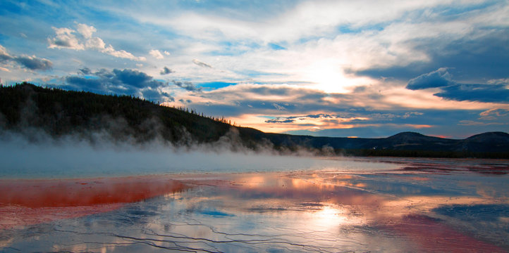 Grand Prismatic Spring at sunset in the Midway Geyser Basin in Yellowstone National Park US