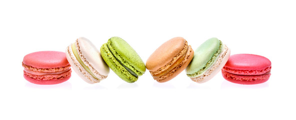  colourful macarons on white background