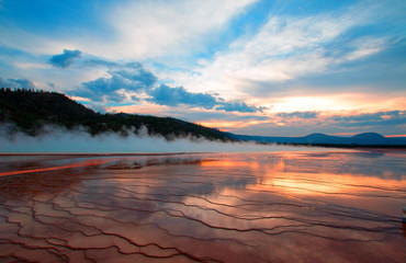 Grand Prismatic Spring at sunset in Yellowstone National Park in Wyoming US