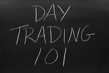 The words "Day Trading 101" on a blackboard in chalk
