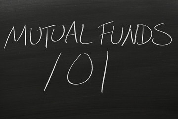 The words "Mutual Funds 101" on a blackboard in chalk