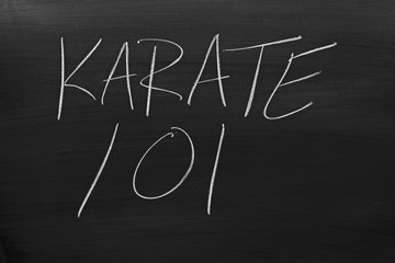The words "Karate 101" on a blackboard in chalk