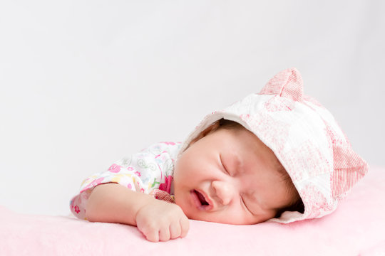 Portrait of adorable baby girl with hat