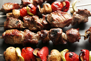 Fresh tasty barbecue with vegetables, closeup