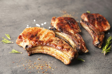 Grilled meat on grey background