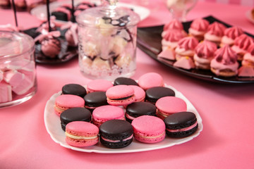 Table with tasty sweets prepared for party, closeup
