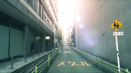 Empty school street in Tokyo. Sign says school zone and thank you © toransu
