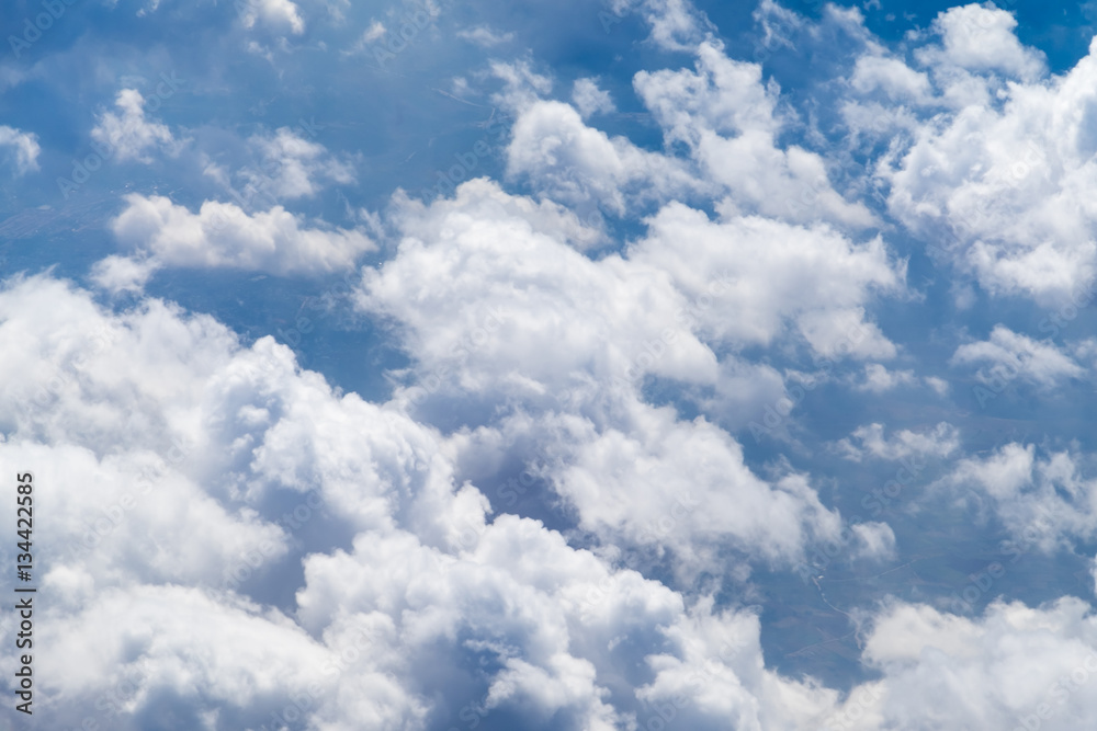 Wall mural aerial view of cloud and sky with ground land from airplane,tra