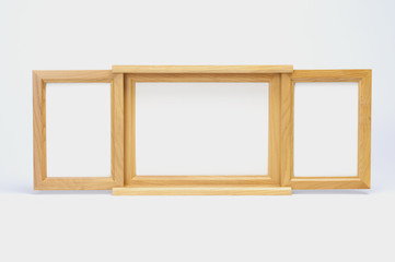 Wooden picture frame on white background.