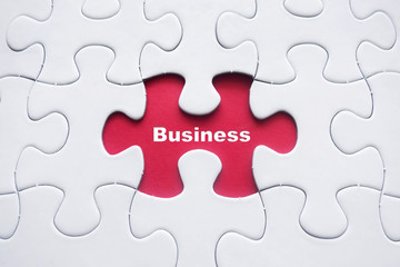 Fototapeta premium Missing puzzle with Business word