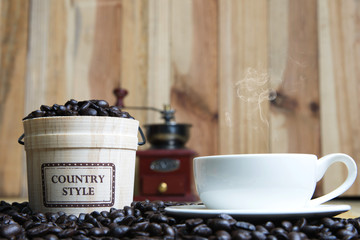 Coffee cup and Coffee beans with casks