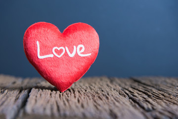 Fototapeta premium Valentines Day background with heart, Red heart on the wooden