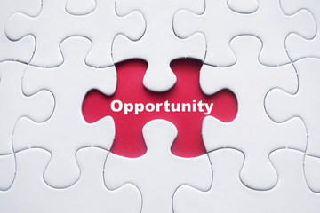 Fototapeta premium Missing puzzle with Opportunity word