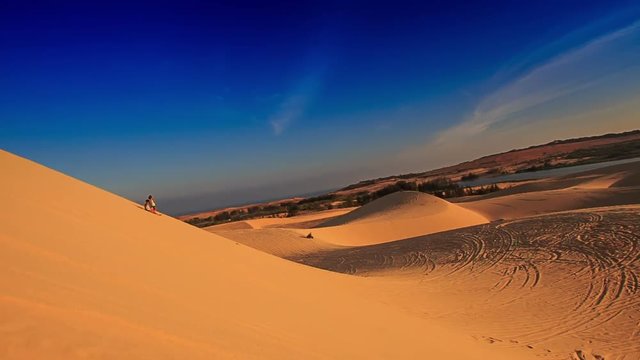 White Sand Dunes with Distant People Jeeps Quads