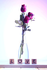  Red rose with heart and wooden alphabet