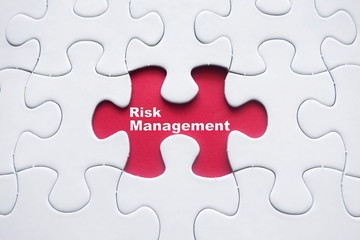 Fototapeta premium Risk Management on jigsaw puzzle