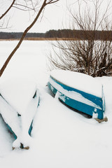 Fishing boats blue snowcapped