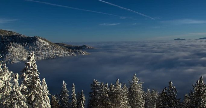 Sierra Nevada Winter Sunrise Landscape. A View east towards the low clouds over Nevada