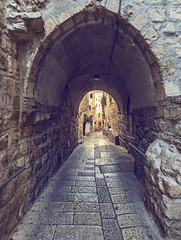 Ancient narrow street in old city of Jerusalem, Israel