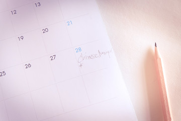 Calendar page in pink tone.