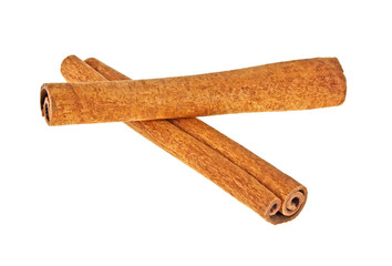 Two cinnamon sticks isolated on white background