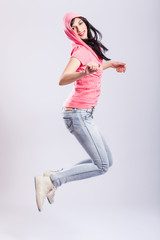 attractive young girl jumping