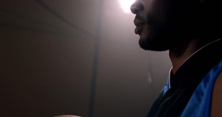 Close-up of determined sportsman holding basketball 4k