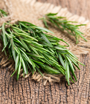 rosemary on a wooden background