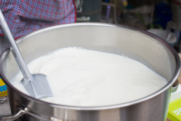 Hot milk boiled in pot