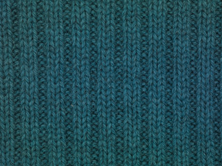 blue fabric sweeter, close up background 