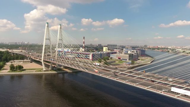 Aerial view at the white cable-stayed Bolshoy Obukhovsky Bridge across Neva river, St. Petersburg, Russia

