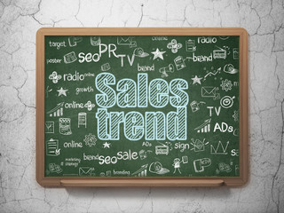 Advertising concept: Sales Trend on School board background